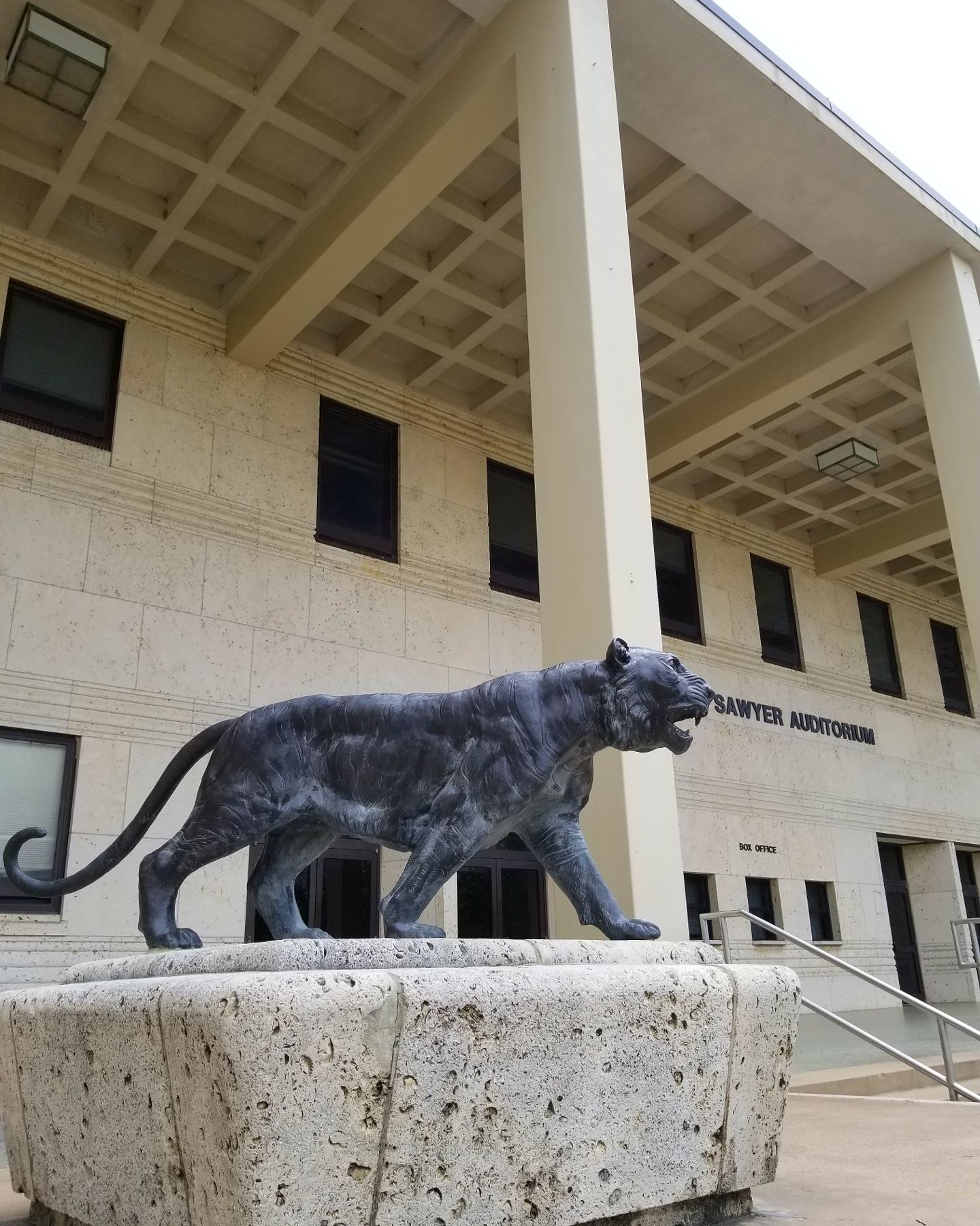 Tiger sculpture outside the Granville M. Sawyer Auditorium